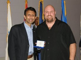 Receiving the Louisiana Veterans Honor Medal from Gov. Bobby Jindal